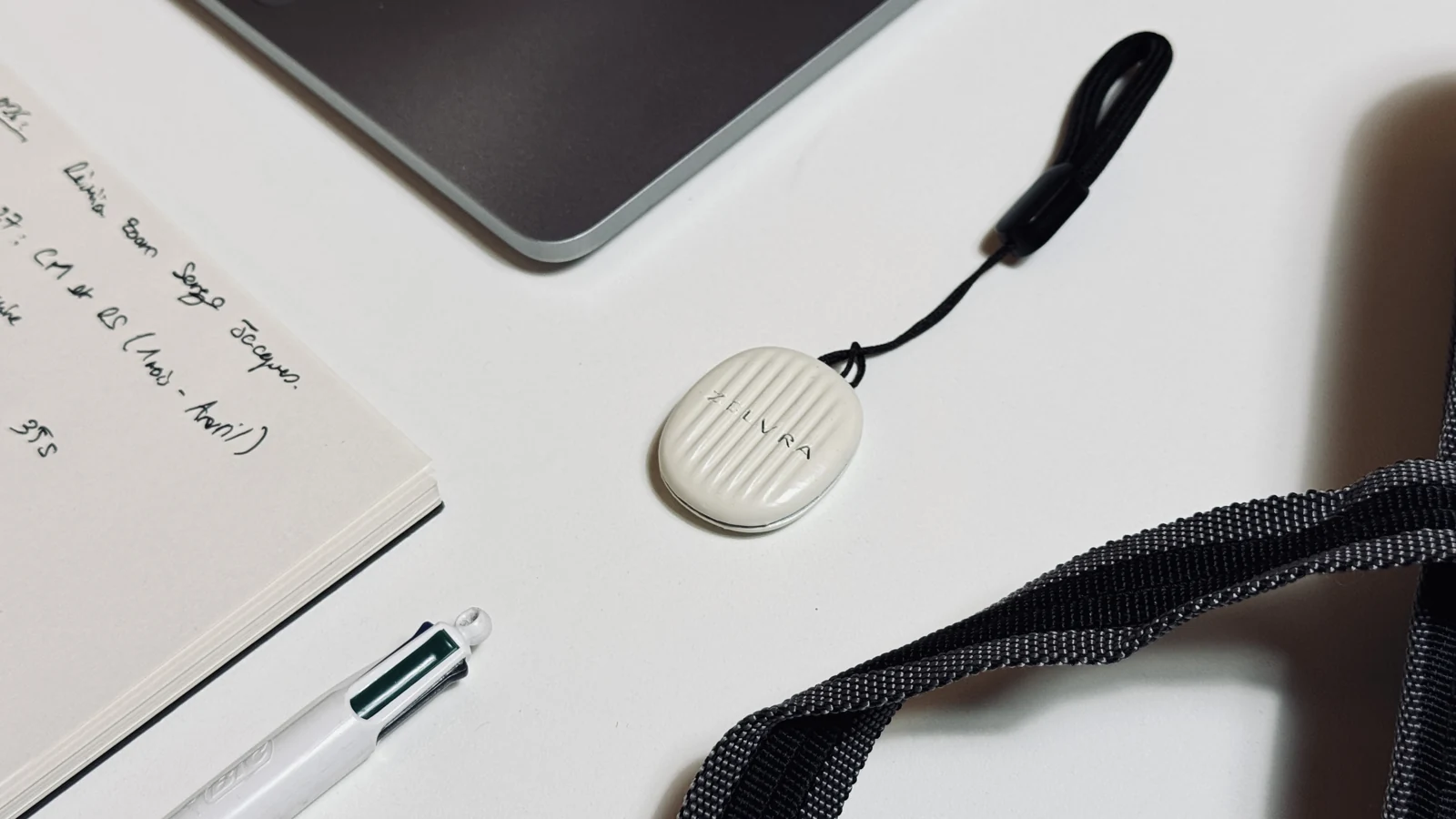 Zelvra demonstrator and wrist strap on a desk